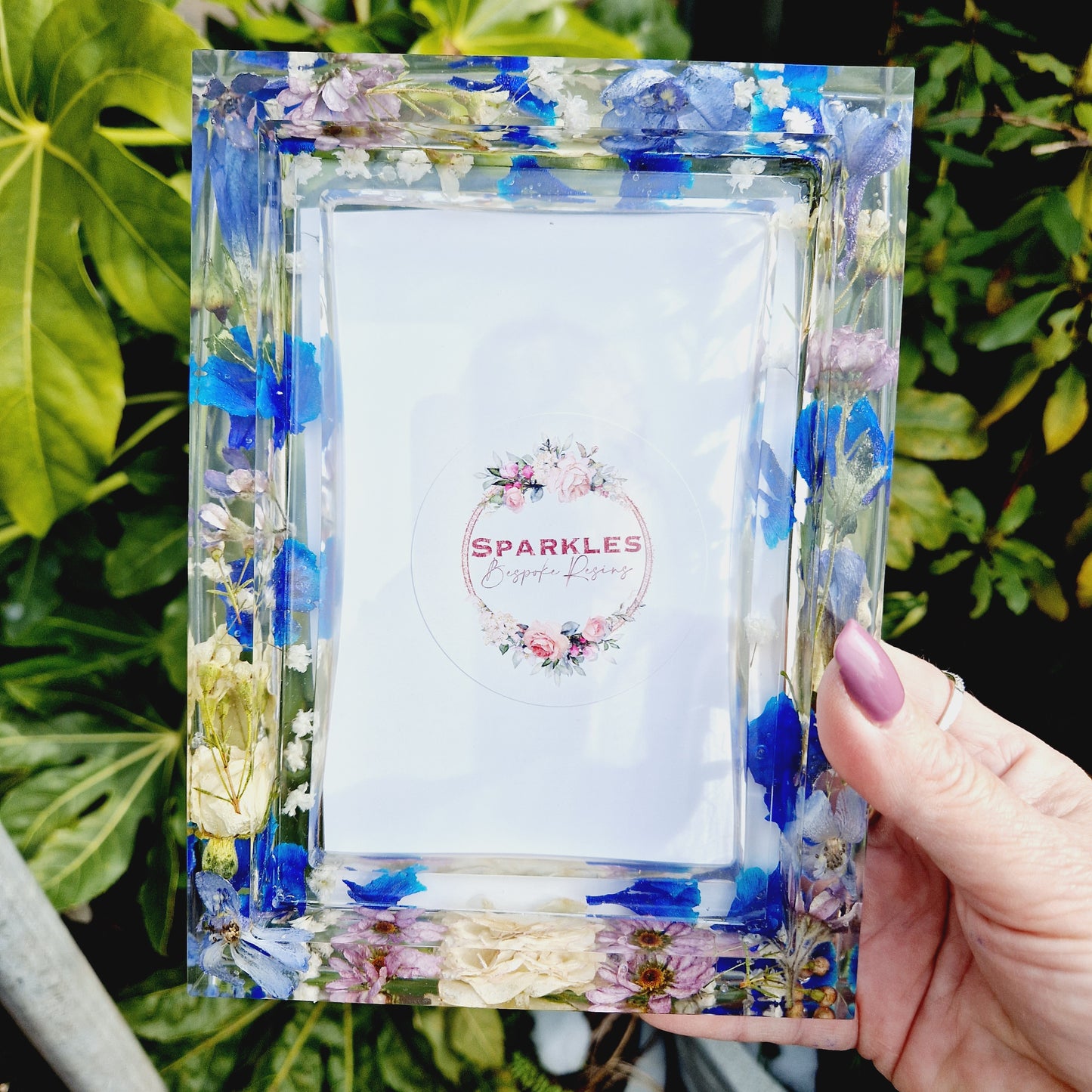 Photo frame with glass front and backing board